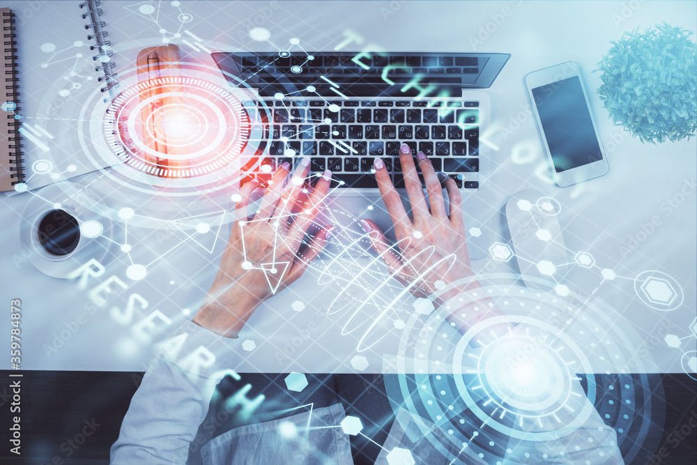 Double exposure of woman hands working on computer and data theme hologram drawing. Top View. Technology concept. Double exposure of woman hands working on computer and data theme hologram drawing. Top View. Technology concept.