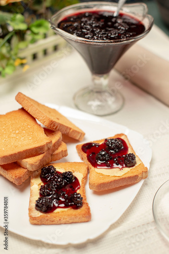 Toasts for breakfast with strawberry jam