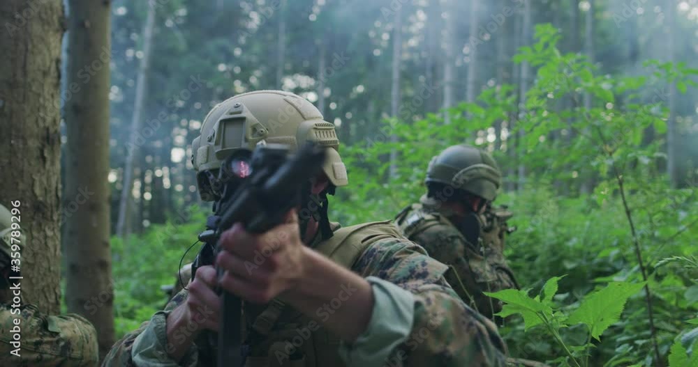 Special forces soldiers with rifle. Military man on the background of nature Special forces soldiers with rifle. Military man on the background of nature
