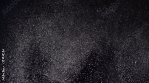 Water spray droplets snow falling on black texture effect