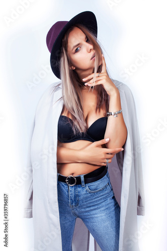 young pretty hipster girl posing emotional happy smiling on white background, lifestyle people concept