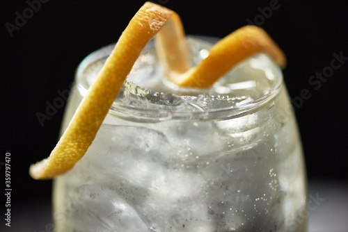 Cocktail in Glass with Lemon Twist Garnish