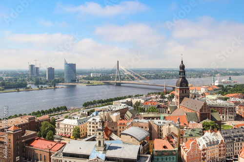 City panorama from above, Riga, Latvia. Beautiful view of the old town and the Daugava river on a sunny day.