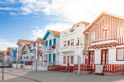 Street with typical striped fishing houses Costa Nova, Aveiro, Portugal