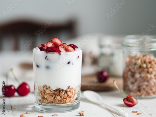 Kefir or yogurt served cherry photo