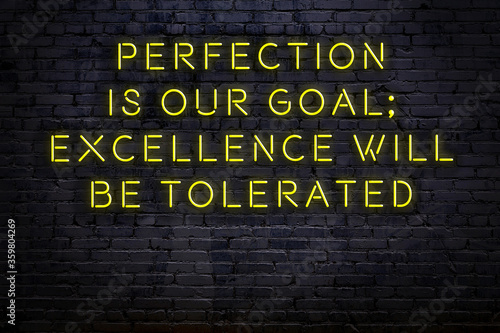 Smart and motivational quotation. Neon sign on brick wall