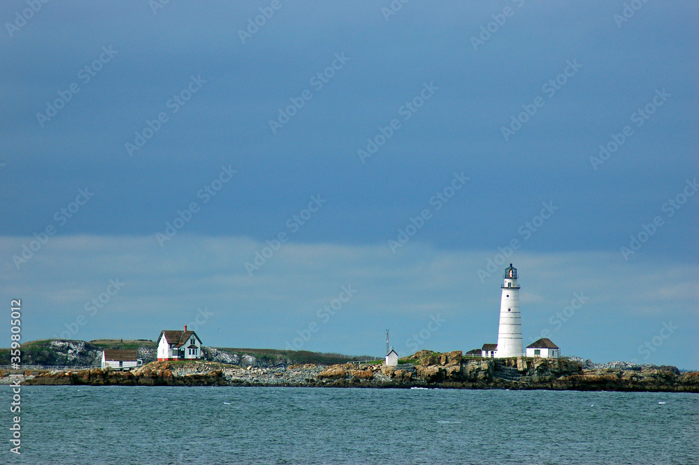 The Boston Harbor Light sits on one of the small islands that dot the harbor