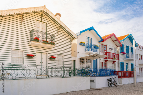 Street with typical striped fishing houses Costa Nova, Aveiro, Portugal