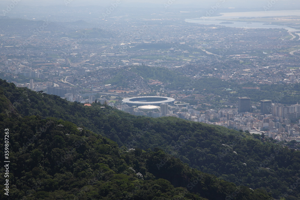 Aerial view of Rio de Janeiro cityscape with Maracana Soccer Stadium, Brazil.