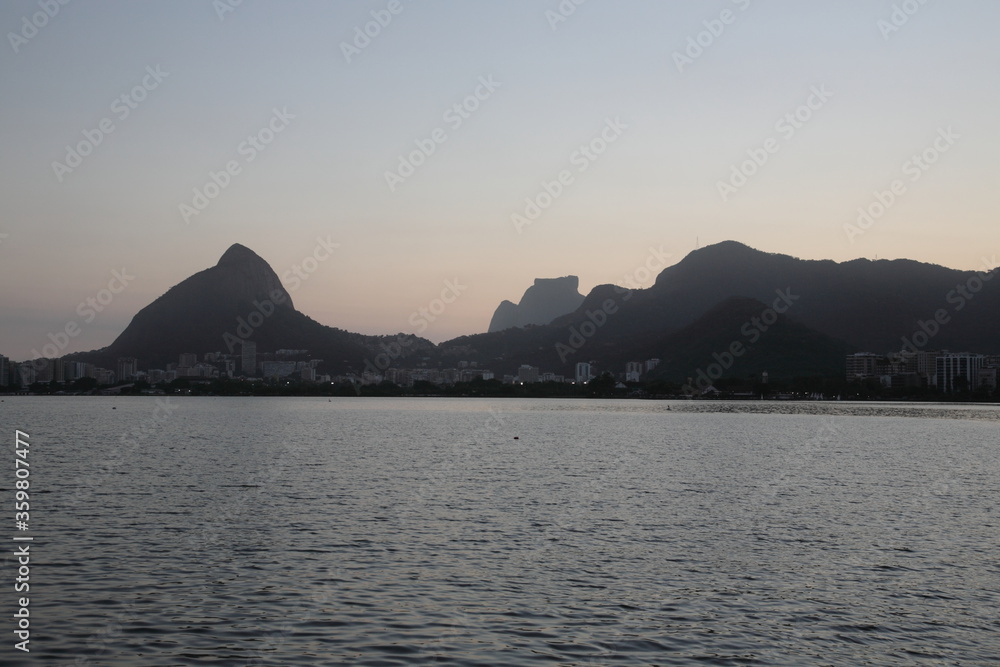 View of Sugarloaf Mountain and Rio de Janeiro Skyline at sunrise, Brazil.