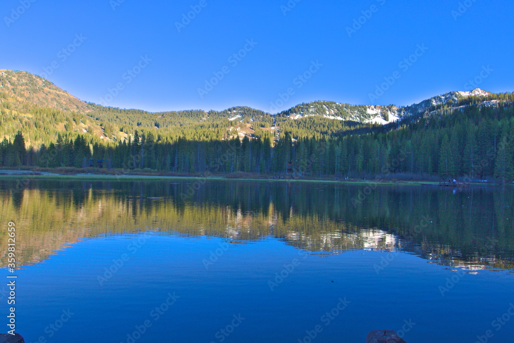 Silver Lake reflections of the mountains in Big Cottonwood Canyon, Utah