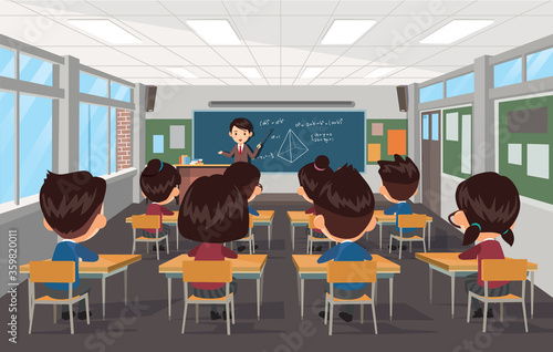 The teacher is teaching students at school