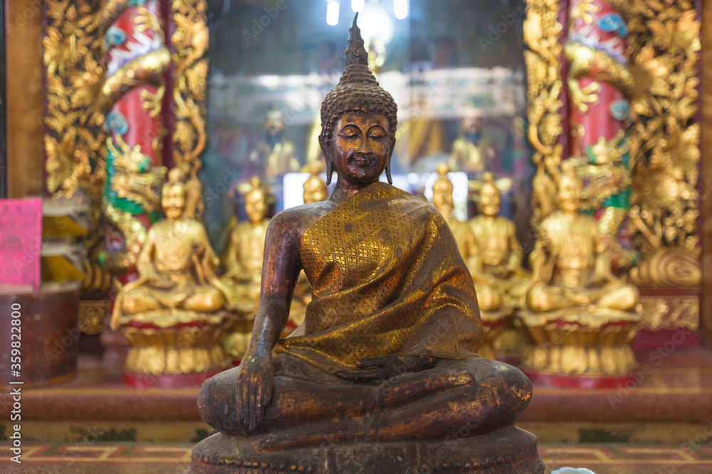 Monk statue at Sothonwararam temple in Thailand
