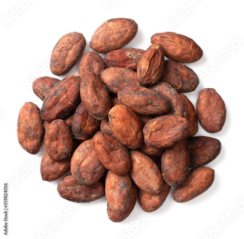 unpeeled cocoa beans isolated on white background