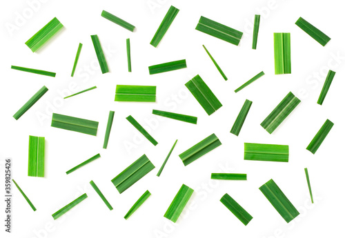 Canvas Print fresh chopped lemongrass leaves isolated on white background, top view