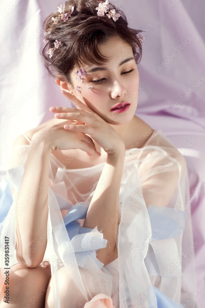 Beautiful Asian flower fairy in the afternoon sun Beautiful Asian flower fairy in the afternoon sun