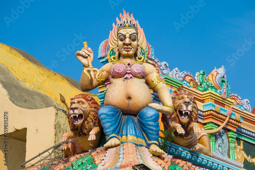 Sculpture of Shiva with a trident and lions in the decoration of the ancient Hindu temple  of Sri Bhadrakali Amman Kovil (Kali Kovil), Sri Lanka photo