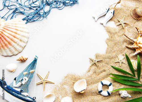 Seashells on sand. Travel concept