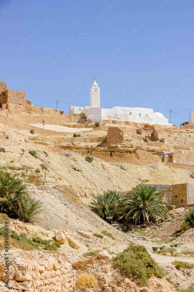 White mosque on top of a hill in Berber village, Sahara