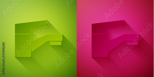 Paper cut Water tap icon isolated on green and pink background. Paper art style. Vector Illustration.