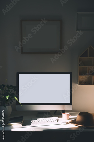 Minimal workspace with computer at home.