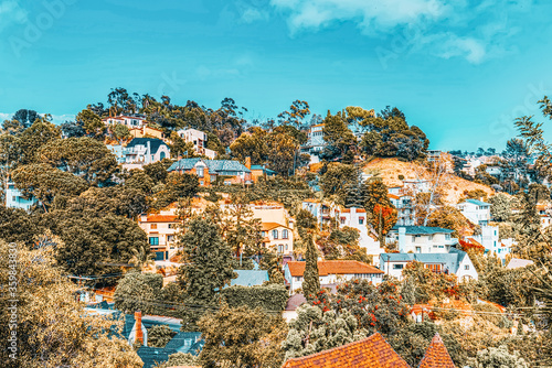 Urban views of the Beverly Hills area and residential buildings on the Hollywood hills.