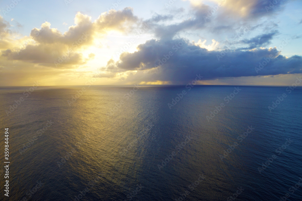 Calm ocean sea view during sunset. Sea horizon. Panoramic view of the pacific ocean. Ocean view background. Landscape.