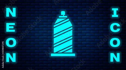 Glowing neon Sewing thread on spool icon isolated on brick wall background. Yarn spool. Thread bobbin. Vector Illustration.