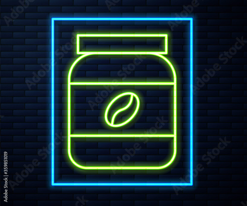 Glowing neon line Coffee jar bottle icon isolated on brick wall background. Vector Illustration.