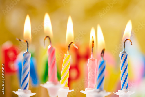 birthday candles on yellow background