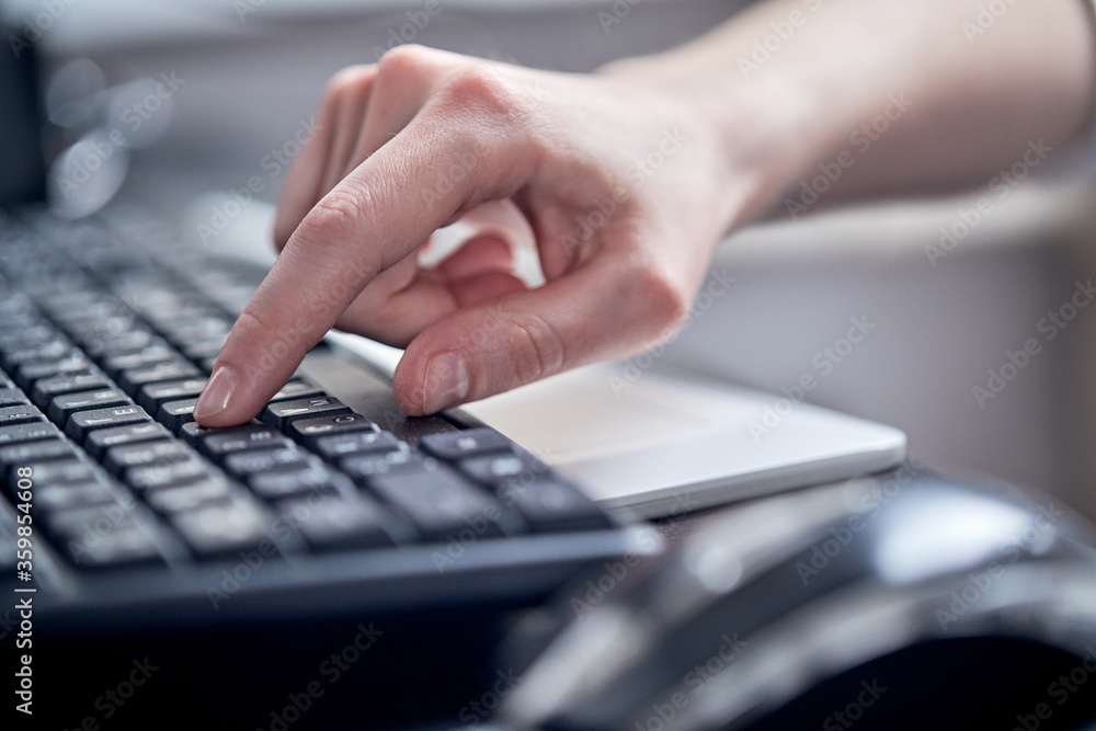 Female hands or woman office worker typing on the keyboard Female hands or woman office worker typing on the keyboard
