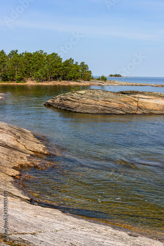 Rocky bay in a archipelago in the summer photo