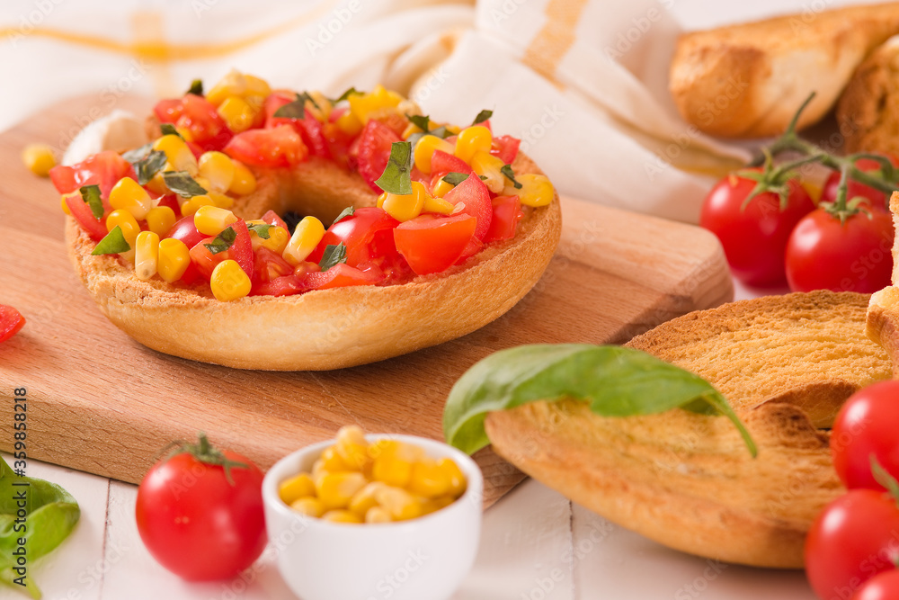 Friselle with tomatoes and mais.
Friselle with tomatoes and mais.