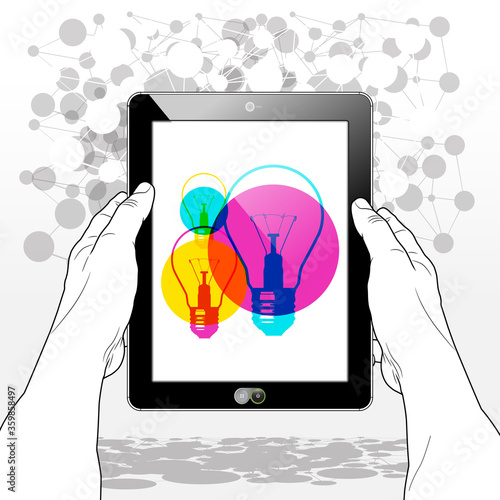 A Tablet PC vertically held firmly in both hands. A "Lightbulb Ideas concept" icon is presented on screen.