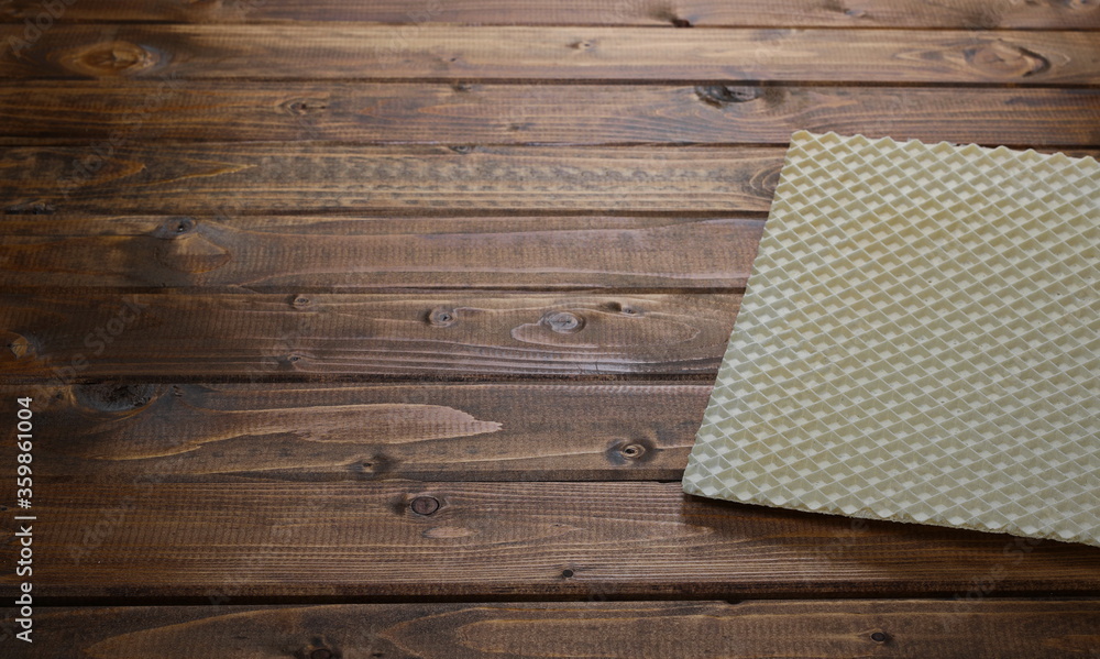 Fototapeta premium Wafer, waffle cornet on wood plank table background and texture