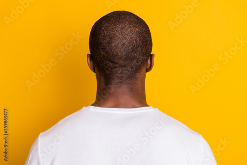 Back rear spine view photo of afro american guy worker stand head hide his personality wear good look clothes isolated over vibrant color background