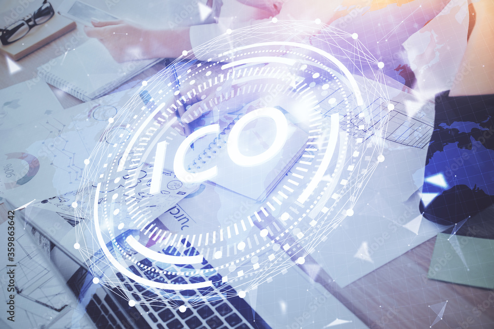 Cryptocurrency hologram over woman's hands writing background. Concept of blockchain. Multi exposure Cryptocurrency hologram over woman's hands writing background. Concept of blockchain. Multi exposure