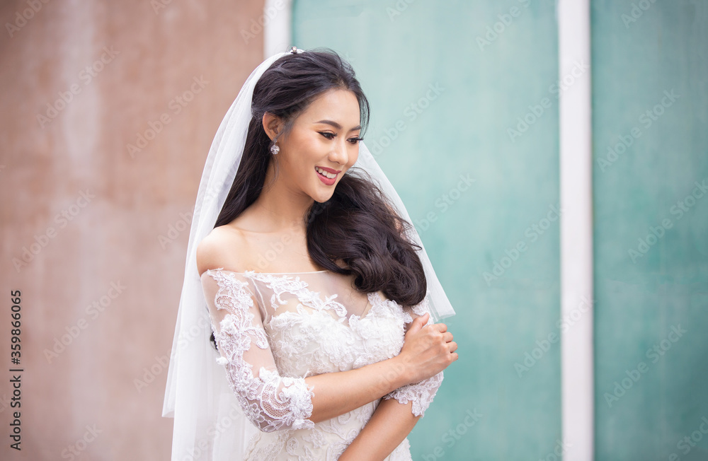 young woman in a wedding dress young woman in a wedding dress