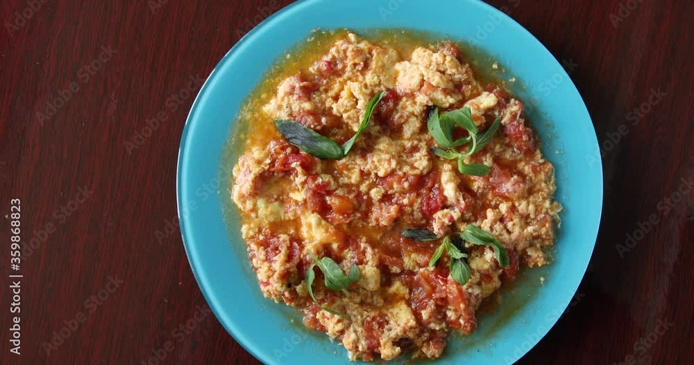 Fried eggs with tomatoes, mince and plain omelet, menemen, Turkish meal Fried eggs with tomatoes, mince and plain omelet, menemen, Turkish meal