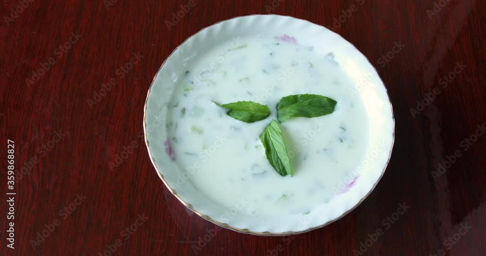 Yogurt with Cucumbers and Herbs close up, Turkish food Yogurt with Cucumbers and Herbs close up, Turkish food
