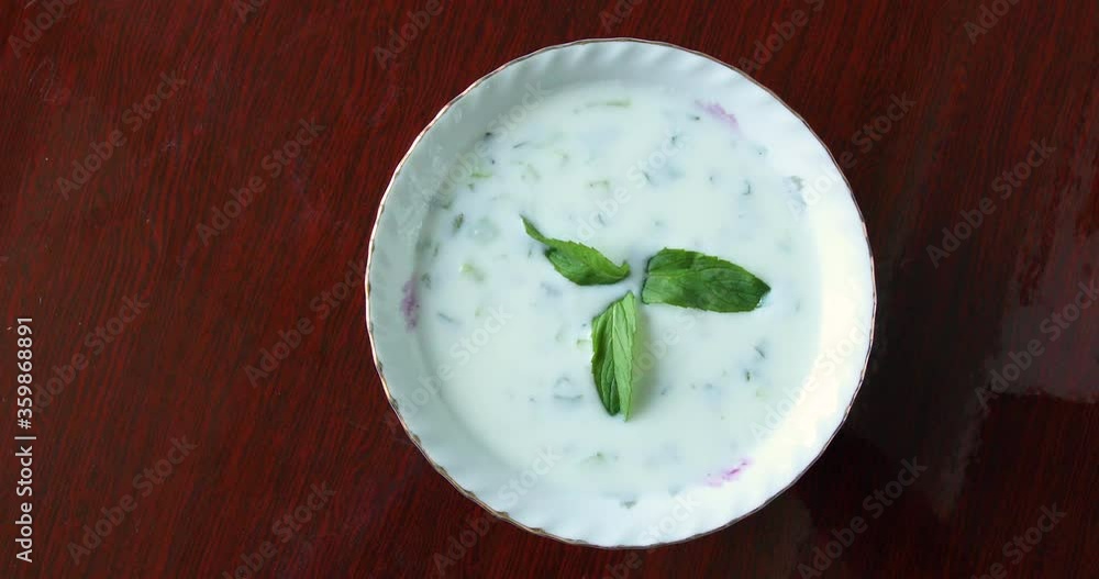 Yogurt with Cucumbers and Herbs close up, Turkish food Yogurt with Cucumbers and Herbs close up, Turkish food