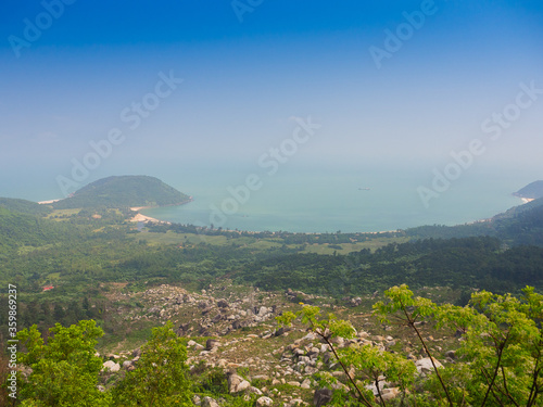 Beautiful view of the coastline of Danang, Vietnam, in a sunrise from the top of a mountain © Fotos 593