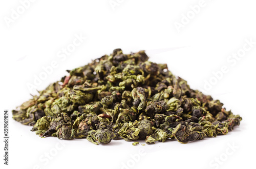 Heap of Tieguanyin chinese Oolong tea isolated on a white background