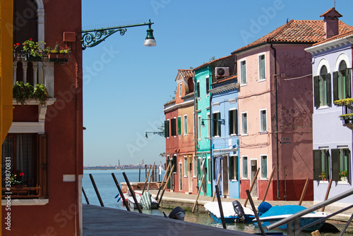 Colorful houses with distant island views. © Roberto Vale