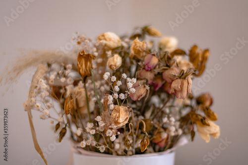 Puget of Dried Flowers in White Pot