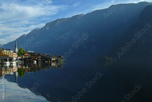 incredibly beautiful view of the city of Hallstatt near the lake and mountains