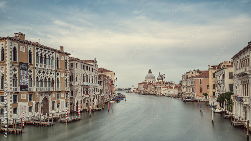 Grand canal venice italy in muted colours before sunrise looking towards Salute from Acadamia district