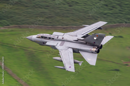 Obraz na plátně RAF (Royal Air Force) Panavia Tornado GR4 Fighter Bomber and reconnaissance jet flying low level in the UK, Cumbria, Wales and Scotland