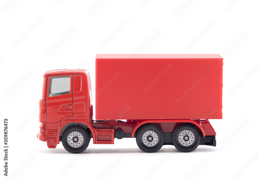 Red cargo delivery truck miniature isolated on white background with clipping path Red cargo delivery truck miniature isolated on white background with clipping path