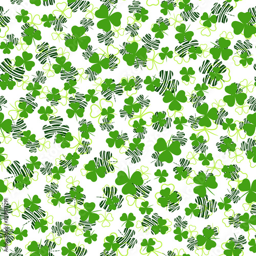 Seamless pattern with green clover leaves. Modern background with repeating elements for packaging  printing  fabric. Vector